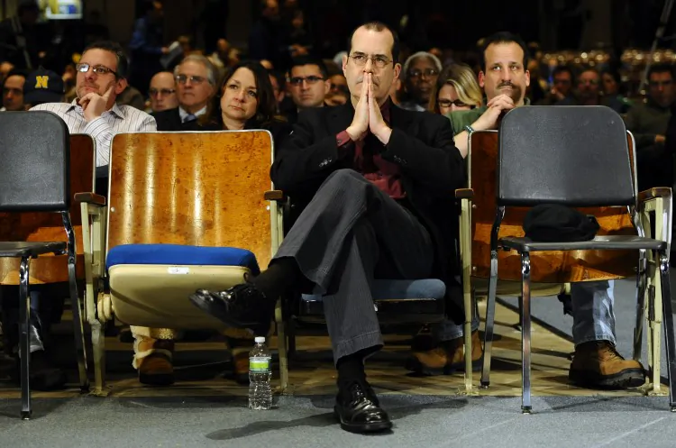 In this Jan. 30, 2013 file photo, David Wheeler, father of Sandy Hook School shooting victim Benjamin, listens to a legislative hearing of a task force on gun violence and children's safety at Newtown High School in Newtown, Conn. (AP Photo/Jessica Hill, File)