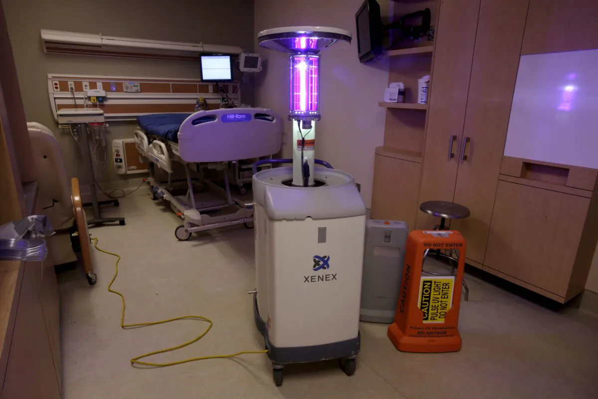 Using ultraviolet light, a machine disinfects a hospital room at the Westchester Medical Center in Valhalla, N.Y., on March 20, 2013. (AP Photo/Seth Wenig)