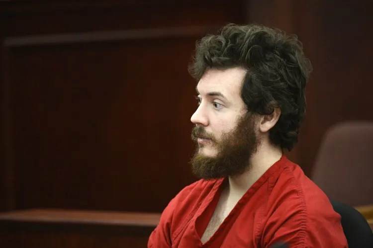 Theater shooting suspect James Holmes sits in the courtroom during his arraignment in Centennial, Colo., on March 12, 2013. (AP Photo/Denver Post, RJ Sangosti, Pool, File)