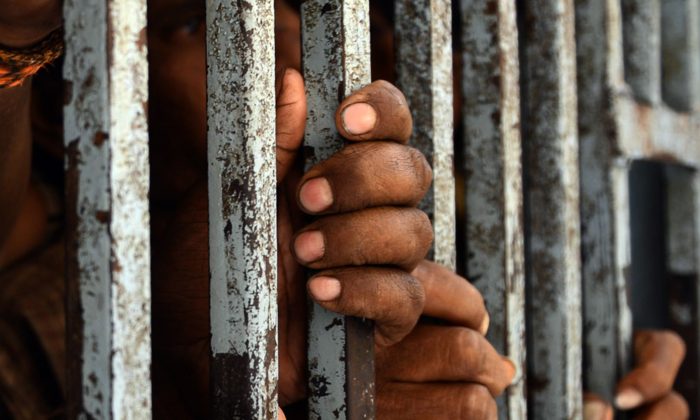 Smart cards were introduced in a prison in Bihar state of India to keep track of inmates and to let them purchase things from canteen through cashless transactions. (Asif Hassan/AFP/Getty Images)