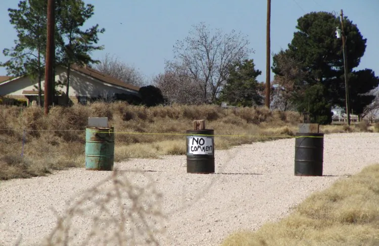In this March 1, 2013 file photo, the driveway to the Shatto family home, rear left, is seen in Gardendale, Texas. In the Jan. 21, 2013 tape released Thursday, April 4, 2013 Laura Shatto tells a 911 operator that Max Shatto isn?t breathing. Later she is heard pleading for help as she tries to revive her dying 3-year-old adopted Russian son while EMS personnel race to her rural West Texas home. (AP Photo/Betsy Blaney)