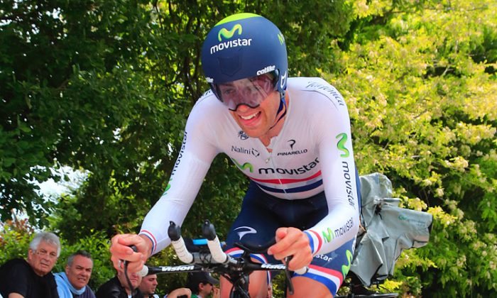 Movistar’s Alex Dowsett, wearing his British Champion’s jersey, rides hard during the Stage Eight time trial of the 2013 Giro d’Italia. (movistarteam.com)