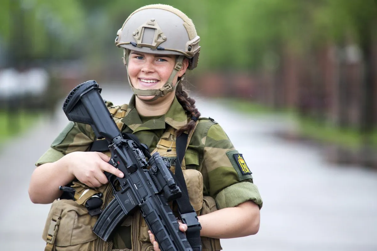 Kjersti Sandvik, 20, a soldier in the Norwegian Royal Guard, in Oslo, Norway, on May 23, 2013. Sandvik voluntarily joined the Guard, but Norway is now considering extending its universal conscription to women as well as men. (Thomas Iversen/The Norwegian Army)
