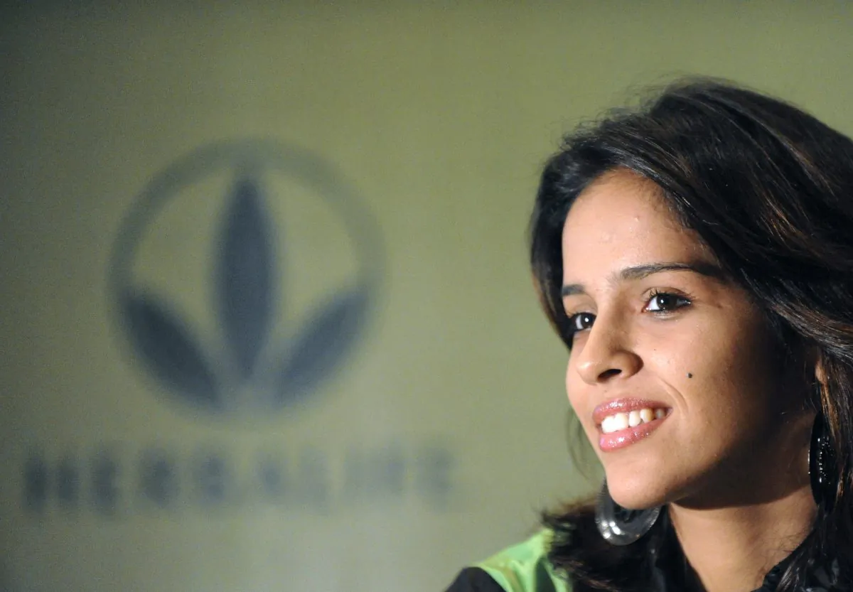 In this 2010 file photo, Indian badminton player Saina Nehwal poses at a Herbalife press conference in Hyderabad, India. In the past year, Herbalife Ltd. has faced repeated accusations of being a pyramid scheme. (Noah Seelam/AFP/Getty Images)
(Noah Seelam/AFP/Getty Images)
