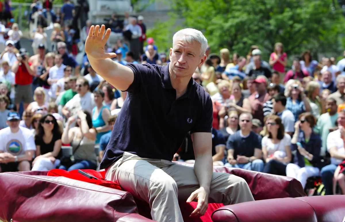 Anderson Cooper during a parade in 2011. Cooper's home was "swatted" while he was away, according to a report. (Robert Laberge/Getty Images)