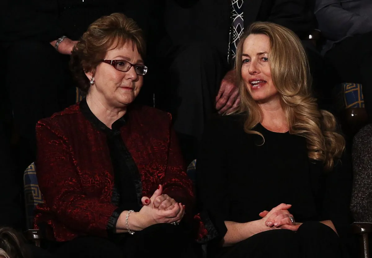 Laurene Powell Jobs, the widow of Steve Jobs, with Warren Buffett’s secretary, Debbie Bosanek prior to the start of U.S. President Barack Obama's State of the Union speech on January 24, 2012 in Washington, DC. (Win McNamee/Getty Images)