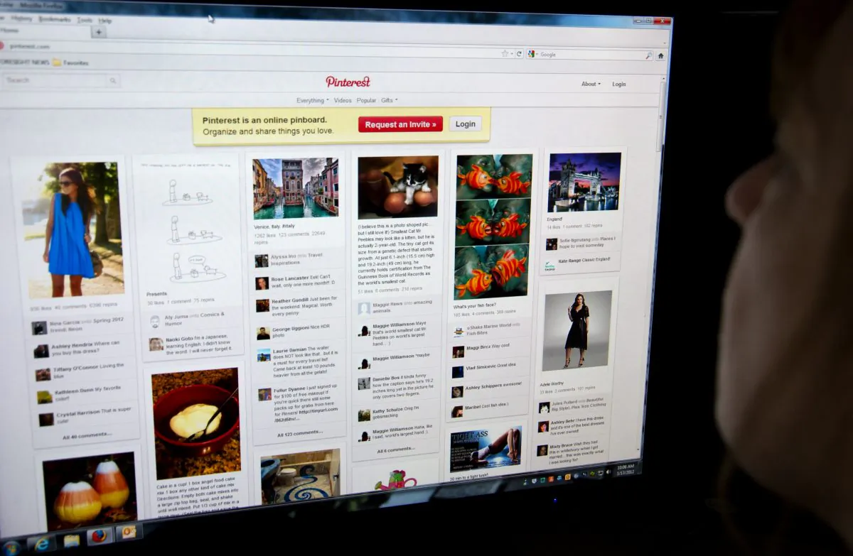 A woman looks at the internet site Pinterest.com on March 13, 2012. (Karen Bleier/AFP/Getty Images)
