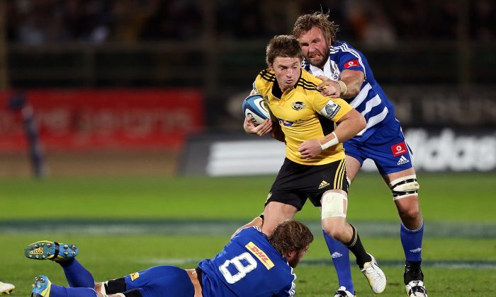 Trying to find rhythm ... Beauden Barrett of the Hurricanes is tackled during the Round 11 Super Rugby against the Stormers at FMG Stadium on April 26, in Palmerston North, New Zealand. (Hagen Hopkins/Getty Images)