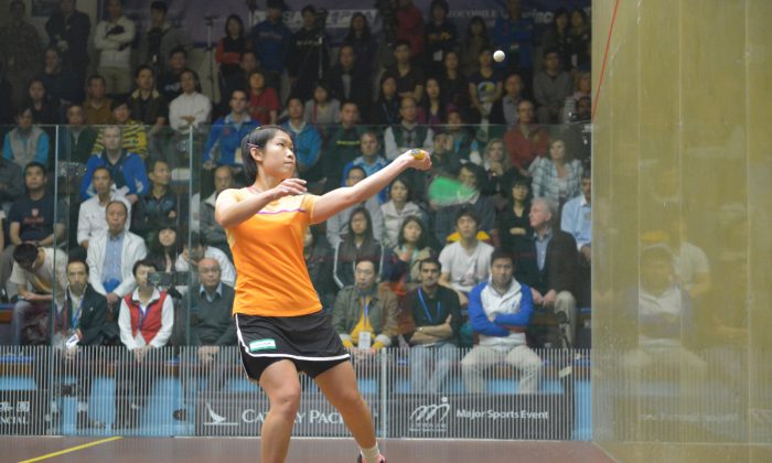 Annie Au (seen here during the 2012 Hong Kong Open) is the first Chinese women to win the Asia Individual Championship, held in Islamabad, Pakistan, between May 1 and May 5, 2013. She beat Lo Wee Wern in four sets to lift the trophy. (Bill Cox/The Epoch Times)