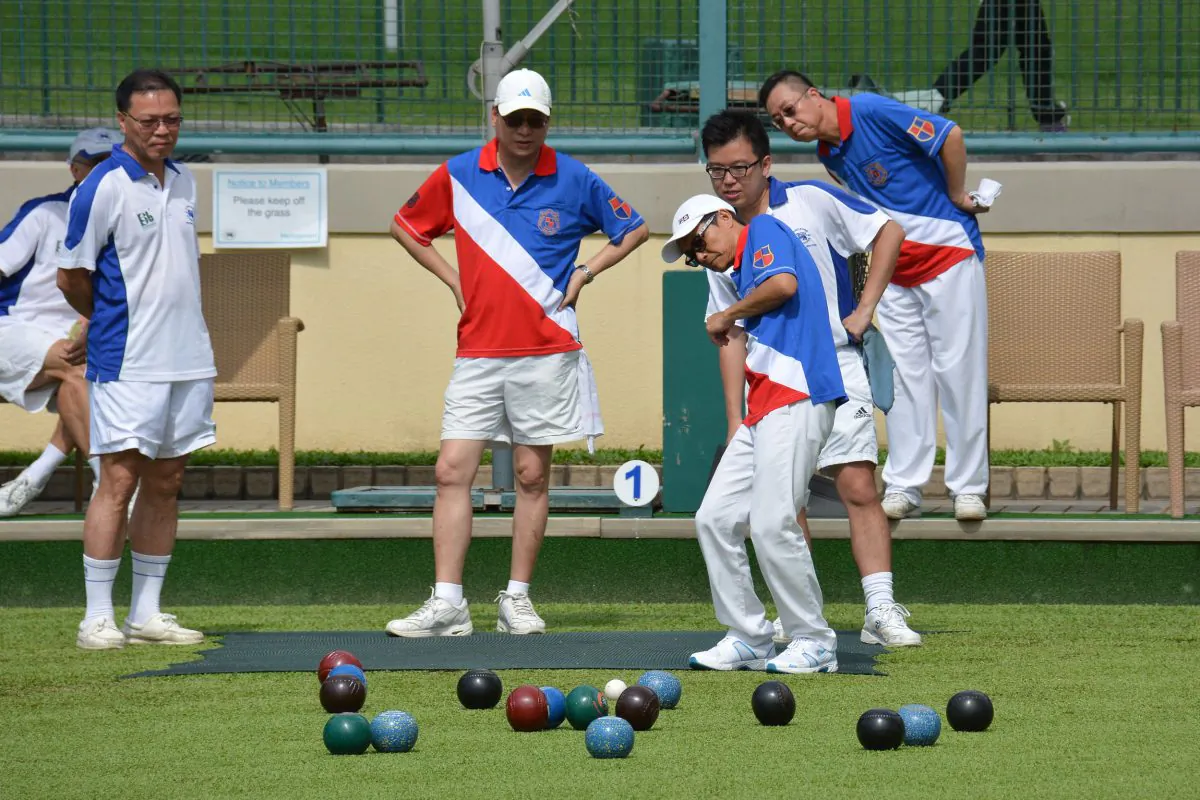 Both the Hong Kong Football Club (in white) and Kowloon Bowling Green Club members get anxious during the Premier League encounter. KBGC emerged with a 6:2 victory. (Stephanie Worth)
