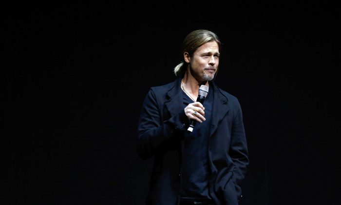 Actor Brad Pitt speaks at a Paramount Pictures presentation to promote his upcoming film, 'World War Z' during CinemaCon at The Colosseum at Caesars Palace on April 15, 2013 in Las Vegas, Nevada. (Isaac Brekken/Getty Images)