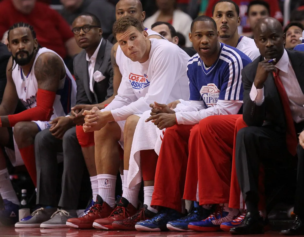 Blake Griffin #32 (center, in white) of the Los Angeles Clippers watches from the bench after leaving the game with an ankle injury against the Memphis Grizzlies during Game Five of the Western Conference Quarterfinals of the 2013 NBA Playoffs at Staples Center on April 30, 2013 in Los Angeles, California. (Stephen Dunn/Getty Images)