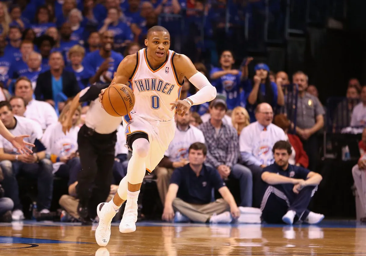 Russell Westbrook #0 of the Oklahoma City Thunder handles the ball during Game Two of the Western Conference Quarterfinals of the 2013 NBA Playoffs against the Houston Rockets at Chesapeake Energy Arena on April 24, 2013 in Oklahoma City, Oklahoma.(Christian Petersen/Getty Images)