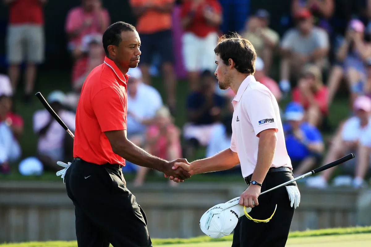 Tiger Woods of the USA shakes hands with Casey Wittenberg after finishing on the 18th green during the final round of THE PLAYERS Championship at THE PLAYERS Stadium course at TPC Sawgrass on May 12, 2013 in Ponte Vedra Beach, Florida. (Photo by Richard Heathcote/Getty Images)
