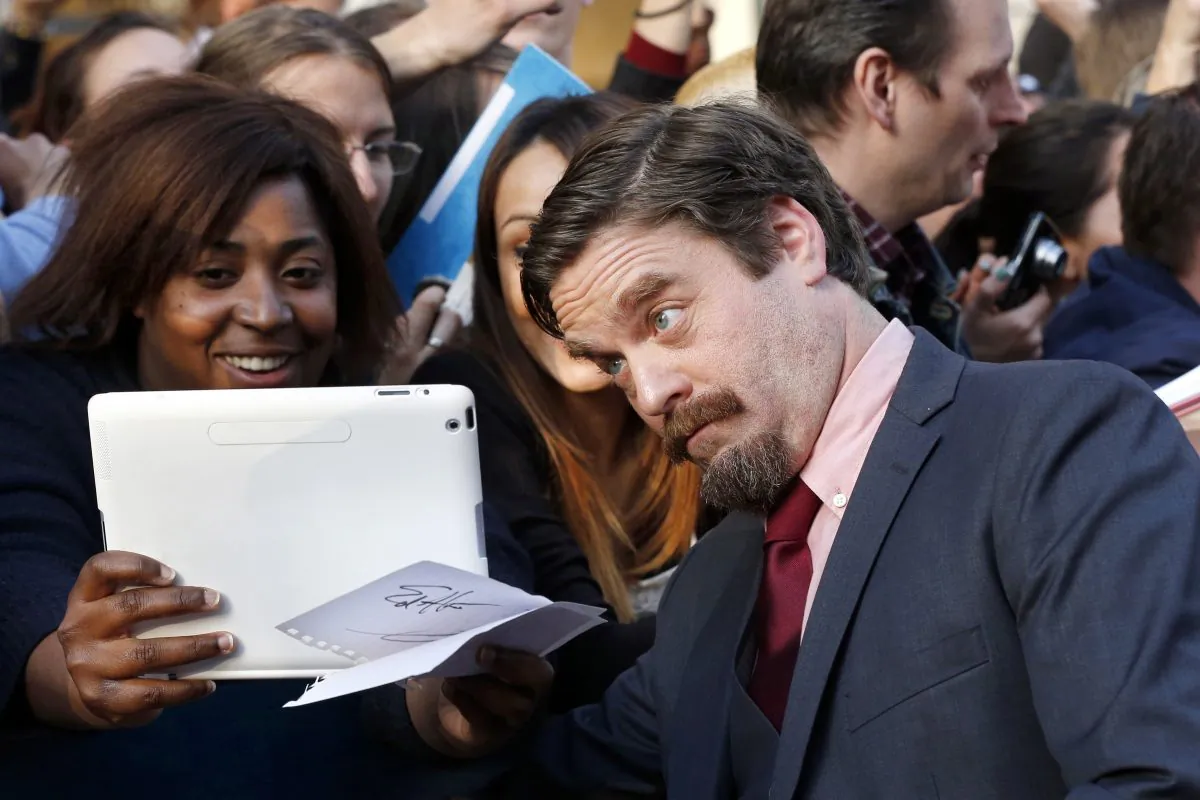 US actor Zach Galifianakis poses with fans before the presentation of the movie 'Hangover 3' directed by US director Todd Phillips on May 27, 2013 in Paris. (Francois Guillot/AFP/Getty Images)