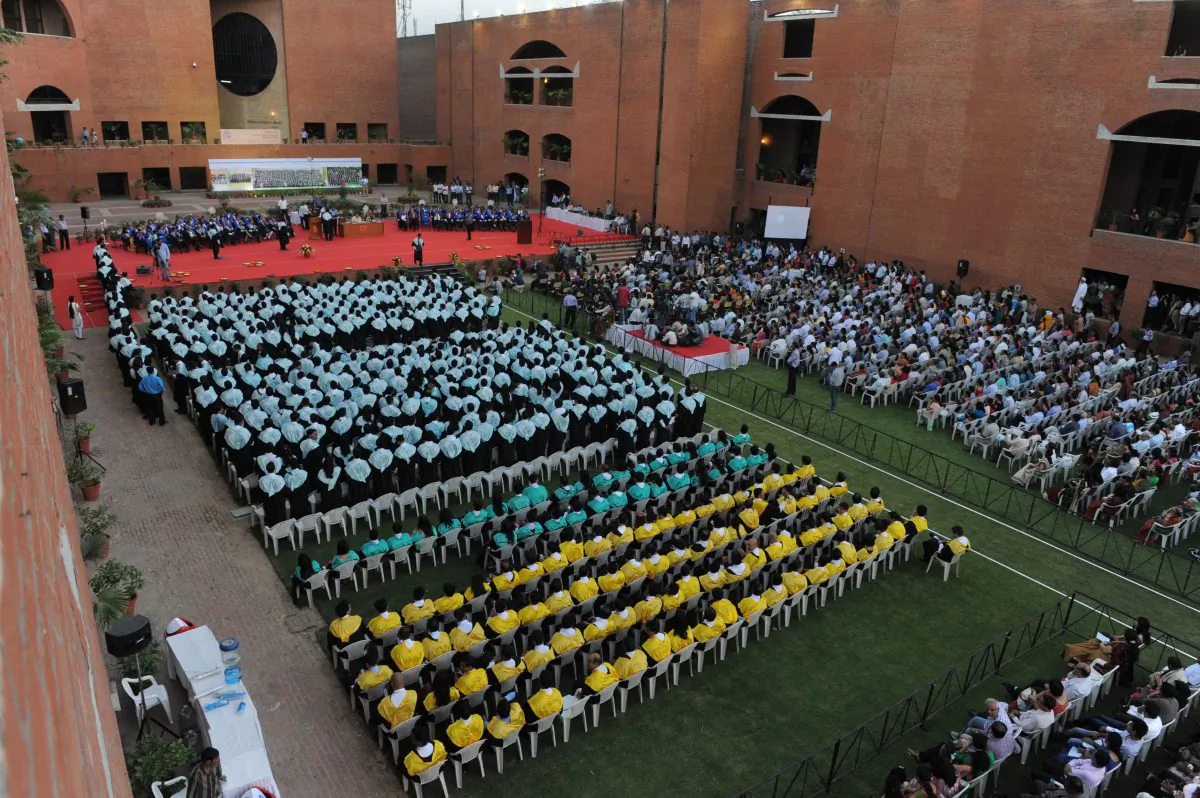 Students attend their graduation ceremony at the Indian Institute of Management-Ahmedabad in Ahmedabad, India, on March 23, 2013. The Indian government has greatly invested in education in efforts to ensure the benefits of economic development reach the poor. Canada has identified core economic opportunities in India in the energy, agriculture, infrastructure, and education sectors. (Sam Panthaky/AFP/Getty Images)