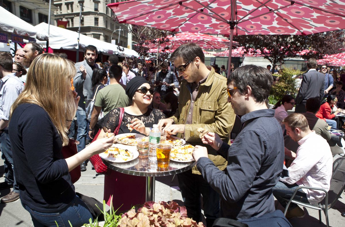 Taking in a beautiful sunny day at Madison Square Eats. (Samira Bouaou/The Epoch Times)