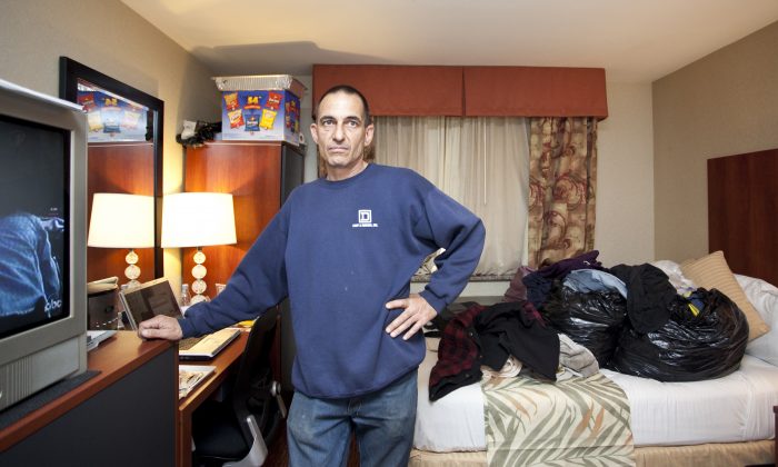Richard Fabio, a Hurricane Sandy evacuee, in the Staten Island Ramada Inn. He has been living in a hotel since Dec. 22, 2012. (Samira Bouaou/The Epoch Times)
