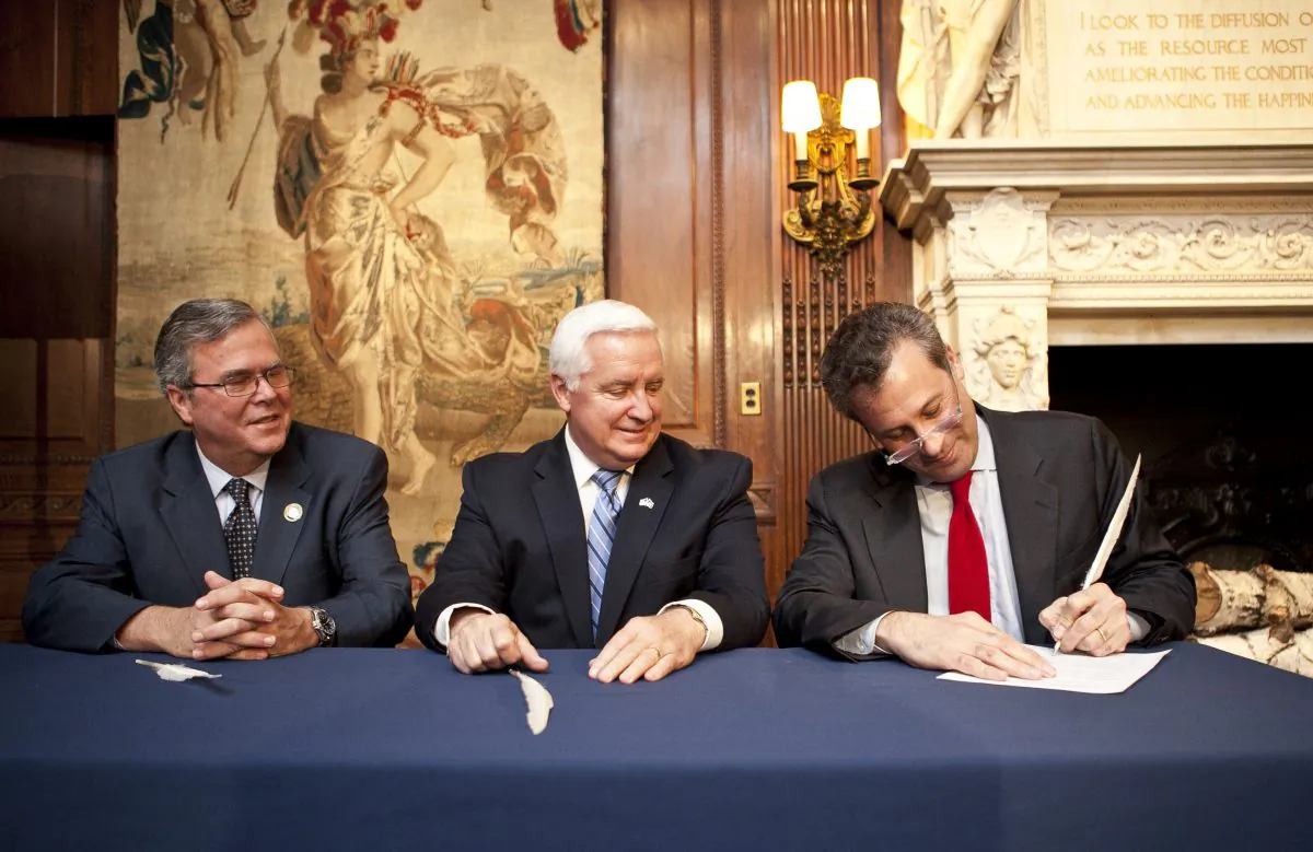 NYPL trustee Ed Wachenheim III (L), Pennsylvania Governor Tom Corbett (C), NYPL president Tony Marx (R), at the 5th avenue New York Public Library on May 22. Corbett and Marx signed an historic agreement that will share an original copy of the Bill of Rights between the Library and the Commonwealth of Pennsylvania. The copy will be available for public view in 2014. (Samira Bouaou/ Epoch Times Staff)