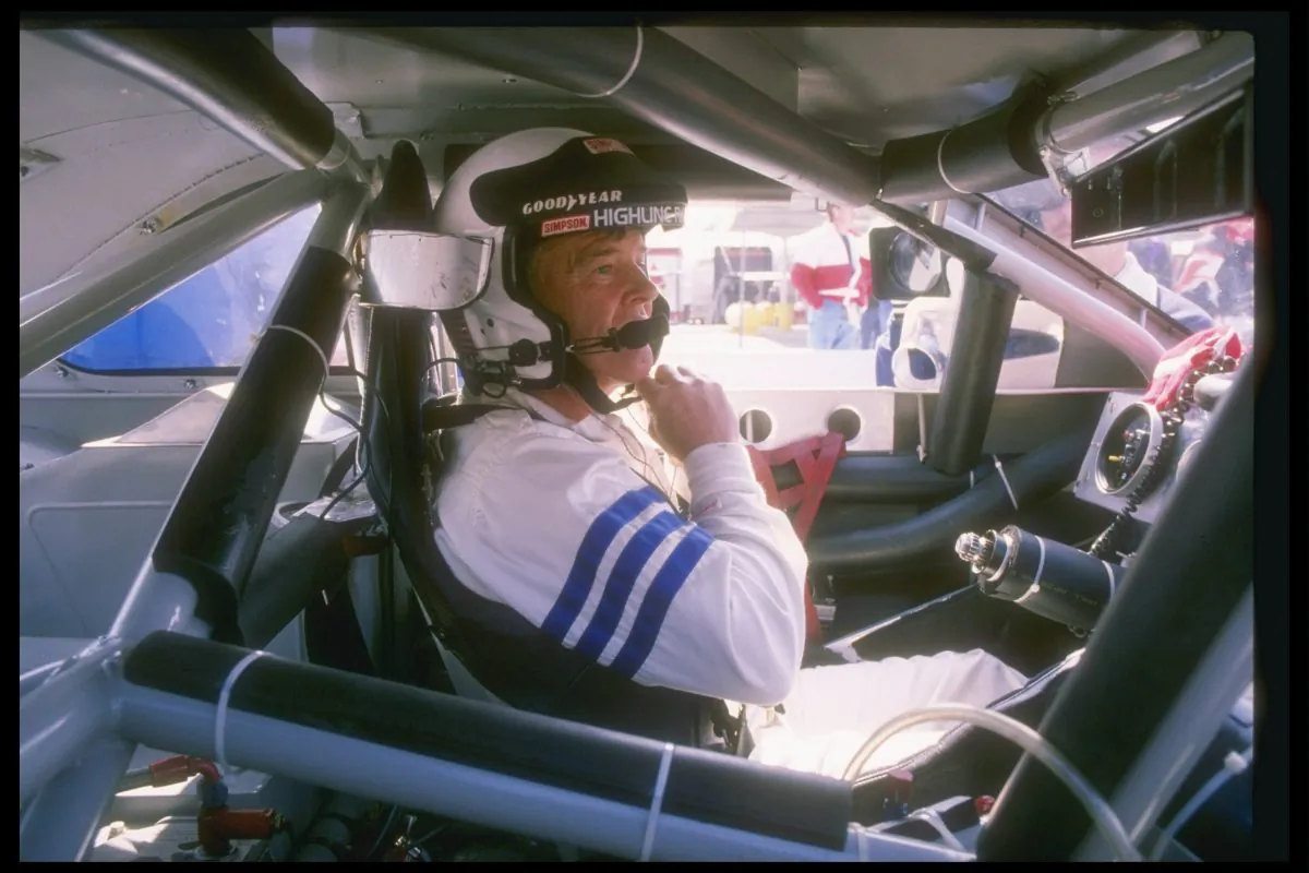 Dick Trickle sits in his car before the start of a NASCAR race in a photo dated from 1993. (Getty Images)