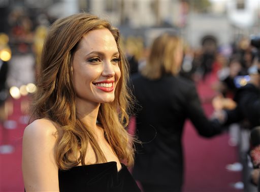 This Feb. 26, 2012 file photo shows actress Angelina Jolie at the 84th Academy Awards in the Hollywood section of Los Angeles. Jolie says that she has had a preventive double mastectomy after learning she carried a gene that made it extremely likely she would get breast cancer. She wrote that between early February and late April she completed three months of surgical procedures to remove both breasts. (AP Photo/Chris Pizzello)