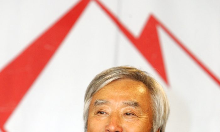 A file photo of Yuichiro Miura answering questions at a news conference in Tokyo on June 7, 2007. Miura is one of Japan's old men of the mountain, a small cluster of graying Japanese climbers who since 2002 have been passing among themselves an august title: the oldest person to have conquered the world's tallest peak. (AP Photo/Shizuo Kambayashi)
