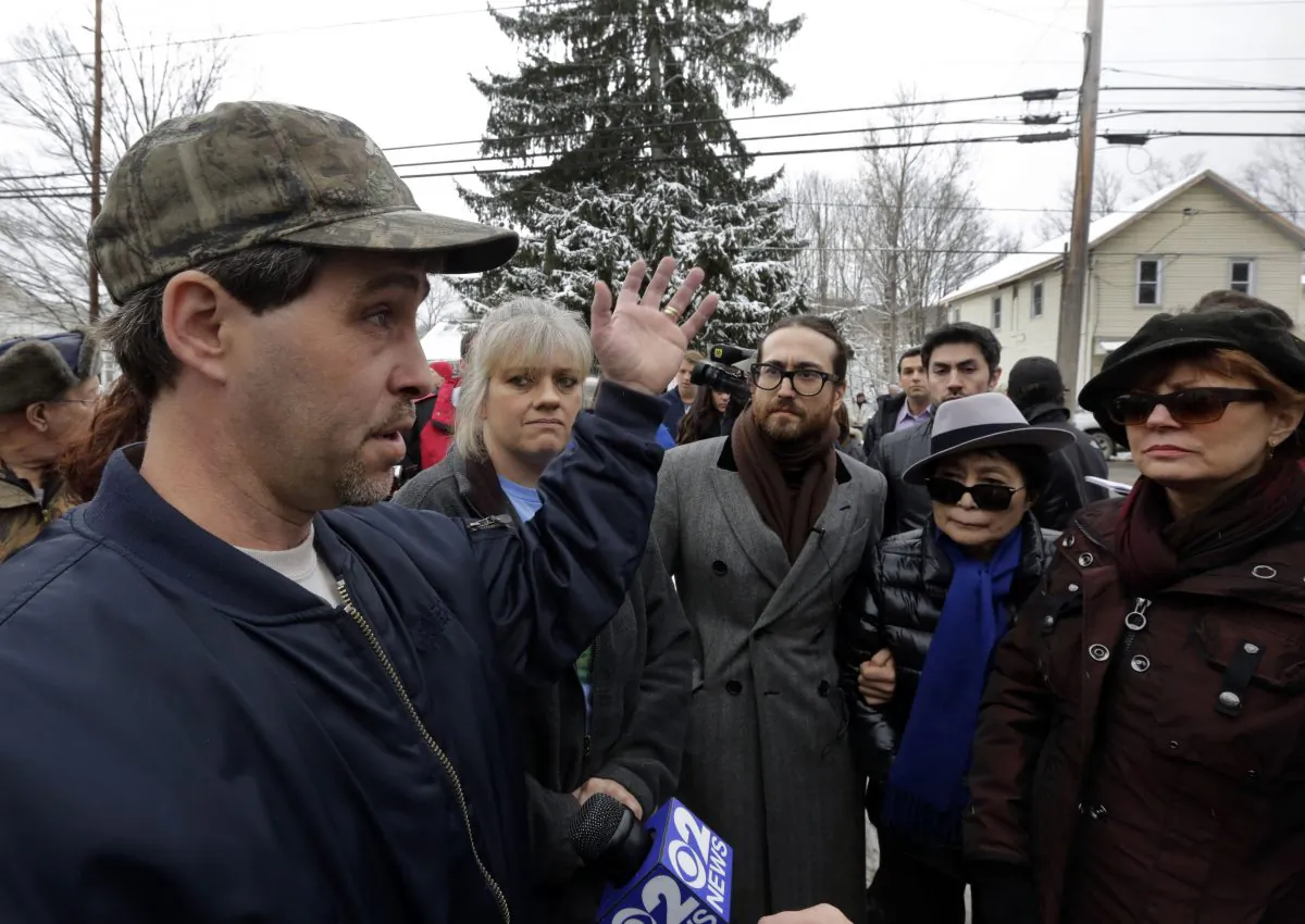 L to R) Matthew Manning speaks with Tammy Manning, Sean Lennon, Yoko Ono, and Susan Sarandon about methane pollution in their water on Jan. 17, in Franklin Forks, Pa. The Mannings blamed hydraulic fracturing for the pollution, however, a study released by the Pennsylvania Department of Preservation on April 29, 2013, said the methane was naturally occurring. (AP Photo/Richard Drew)