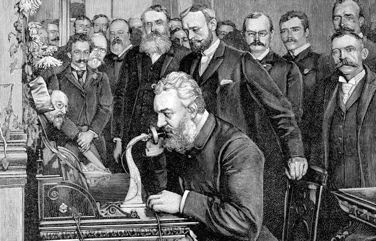 An artist’s rendition shows Alexander Graham Bell sitting at the New York end of the first long-distance line to Chicago as he inaugurates real long-distance telephone service in 1892.  (Photos.com)

