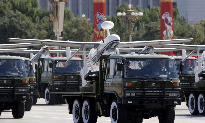 A truck loaded with the Chinese made drone, the ASN-207, takes part in a military parade on Oct. 1, 2009. (Vincent Thian/AP)