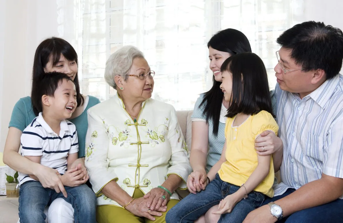 A grandmother is surrounded by her devoted family. Traditional Chinese culture regards filial piety as the root of all virtue and teaches that observance of filial piety begins with one’s parents, extends to the service of the ruler, and brings about peace and harmony in the world. (Wong Sze Yuen/Photos.com)