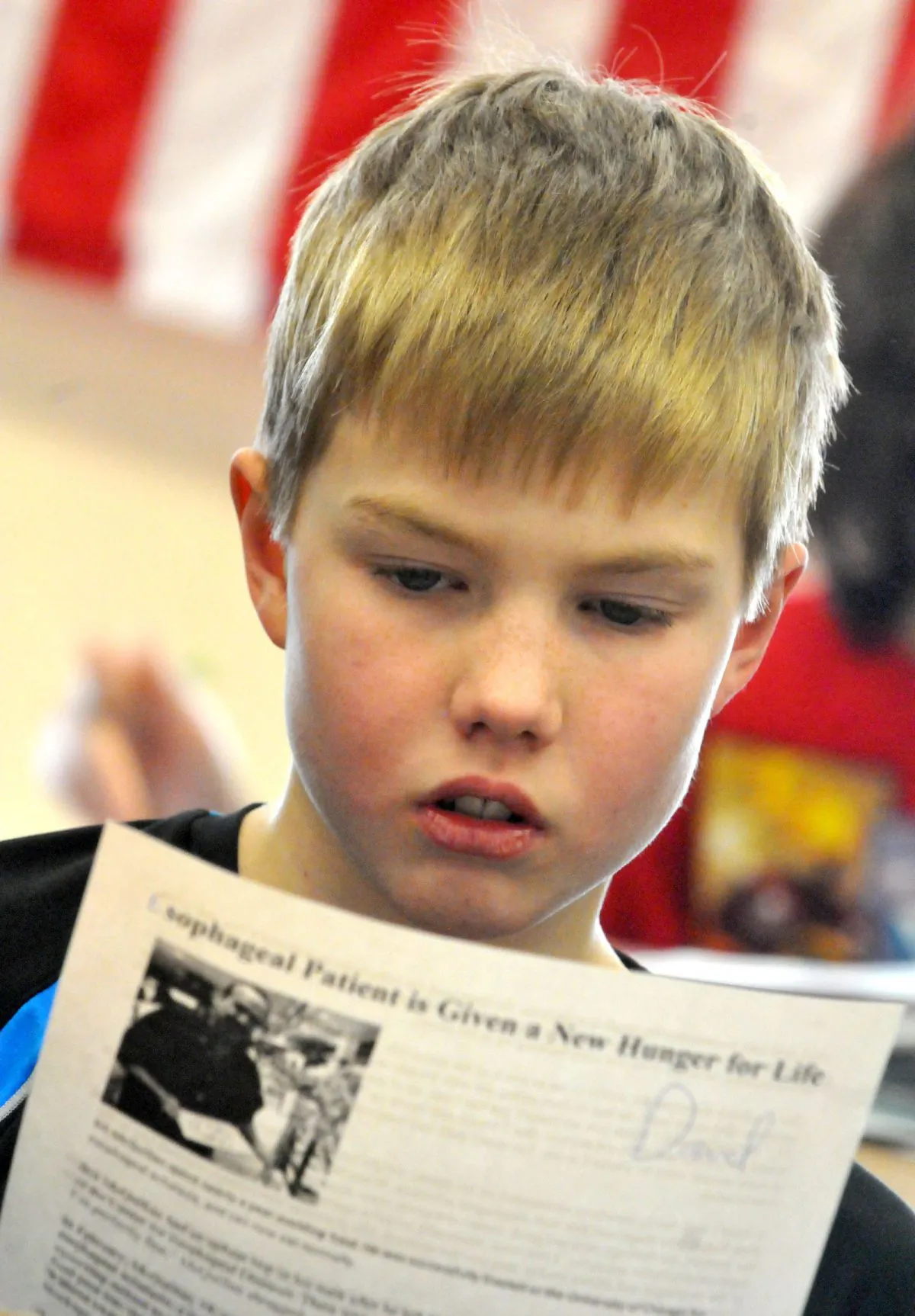 A photo of fifth-grader Daniel Slotten reading for comprehension during an exam that reflects new literacy standards for the Common Core initiative at a Westview Elementary School class in Apple Valley, Minn. on Feb. 20, 2013. (AP Photo/The St. Paul Pioneer Press, John Doman)