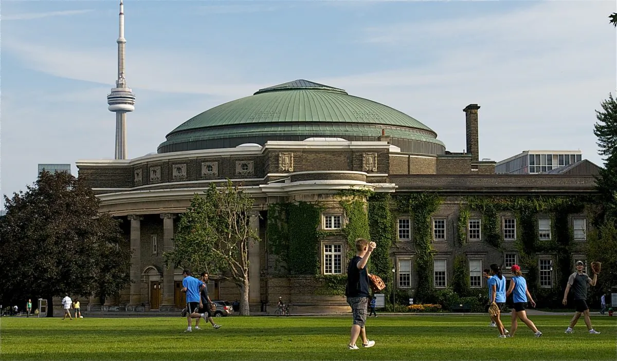 Students play baseball in front of Convocation Hall at the University of Toronto. Canada’s education system needs dramatic change to meet the needs of the future, argues Stephen Murgatroyd. (Matthew Little/The Epoch Times)