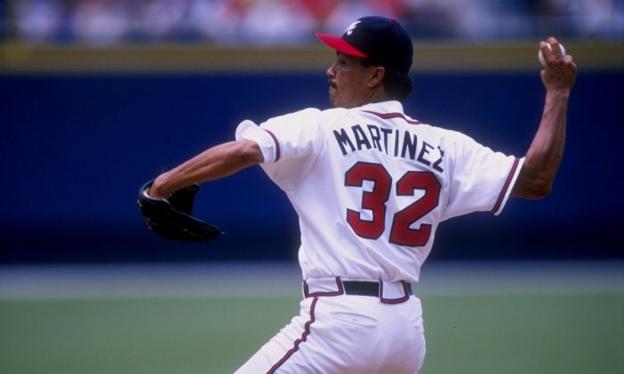 Pitcher Dennis Martinez, aka El Presidente, of the Atlanta Braves in action during a game against the Florida Marlins at Turner Field in Atlanta, Georgia. (Matthew Stockman/Getty Images)