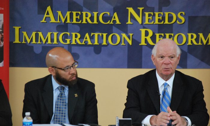 Senator Cardin (D-Md.) (R) speaks with community leaders at an immigration reform roundtable at Casa De Maryland in Hyattville, Md., on May 21. (Ron Dory/The Epoch Times)