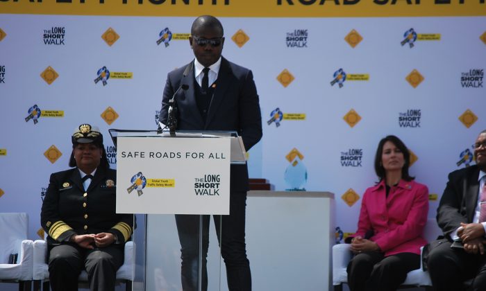 Kweku Mandela speaks of youth killed in car crashes in the developing world at the kick off rally for the Global Traffic Safety Month in Washington, D.C. on May 8, 2013. (Ron Dory/Epoch Times)