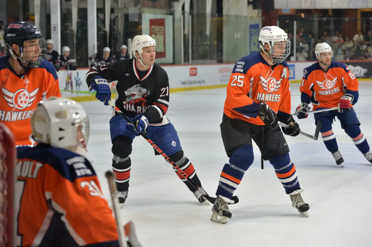 Wayne Pimeau, the ex-NHL star wearing No. 21 for the Kreuz Subsea Sharks at the Mega Ice 5’s, was in among the Singapore Hawkers that they played and beat 4-0 in the Final on Saturday May 11, 2013. (Patrick Calkins)