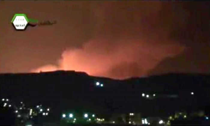 Smoke and fire fill the the skyline over Damascus, Syria, early Sunday, May 5, 2013 after an Israeli airstrike in an image taken from Ugarit News footage. Israeli warplanes targeted a shipment of highly accurate missiles believed to be on their way to Lebanon's Hezbollah terrorist group. (AP Photo/Ugarit News via AP video)