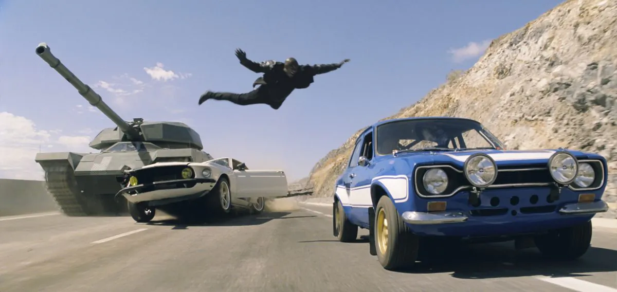 Roman (Tyrese Gibson) makes a death-defying leap in the action-thriller “Fast & Furious 6.” Gibson was being a bad father by not spending time with his daughter following a delay in "Fast & Furious 7" filming, the mother of the daughter says in court filings. (Courtesy of Universal Pictures)