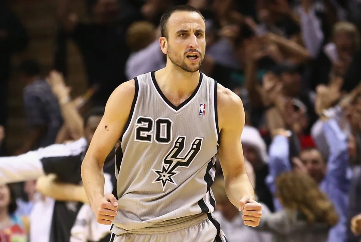  Manu Ginobili #20 of the San Antonio Spurs celebrates after scoring the game winning shot against the Golden State Warriors in double overtime during Game One of the Western Conference Semifinals of the 2013 NBA Playoffs at AT&T Center on May 6, 2013 in San Antonio, Texas. (Ronald Martinez/Getty Images) 