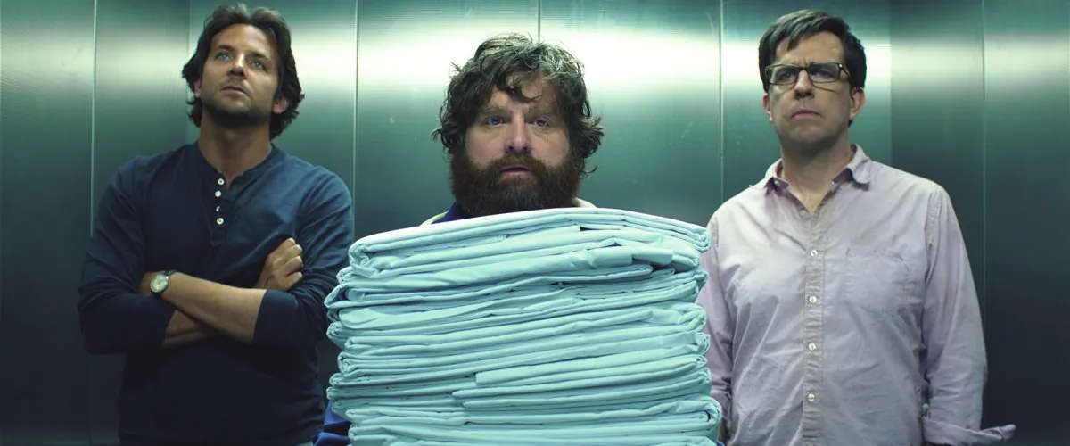 (L–R) Phil (played by Bradley Cooper), Alan (Zach Galifianakis), and Stu (Ed Helms) in the comedy “The Hangover Part III.” (Courtesy of Warner Bros. Pictures)