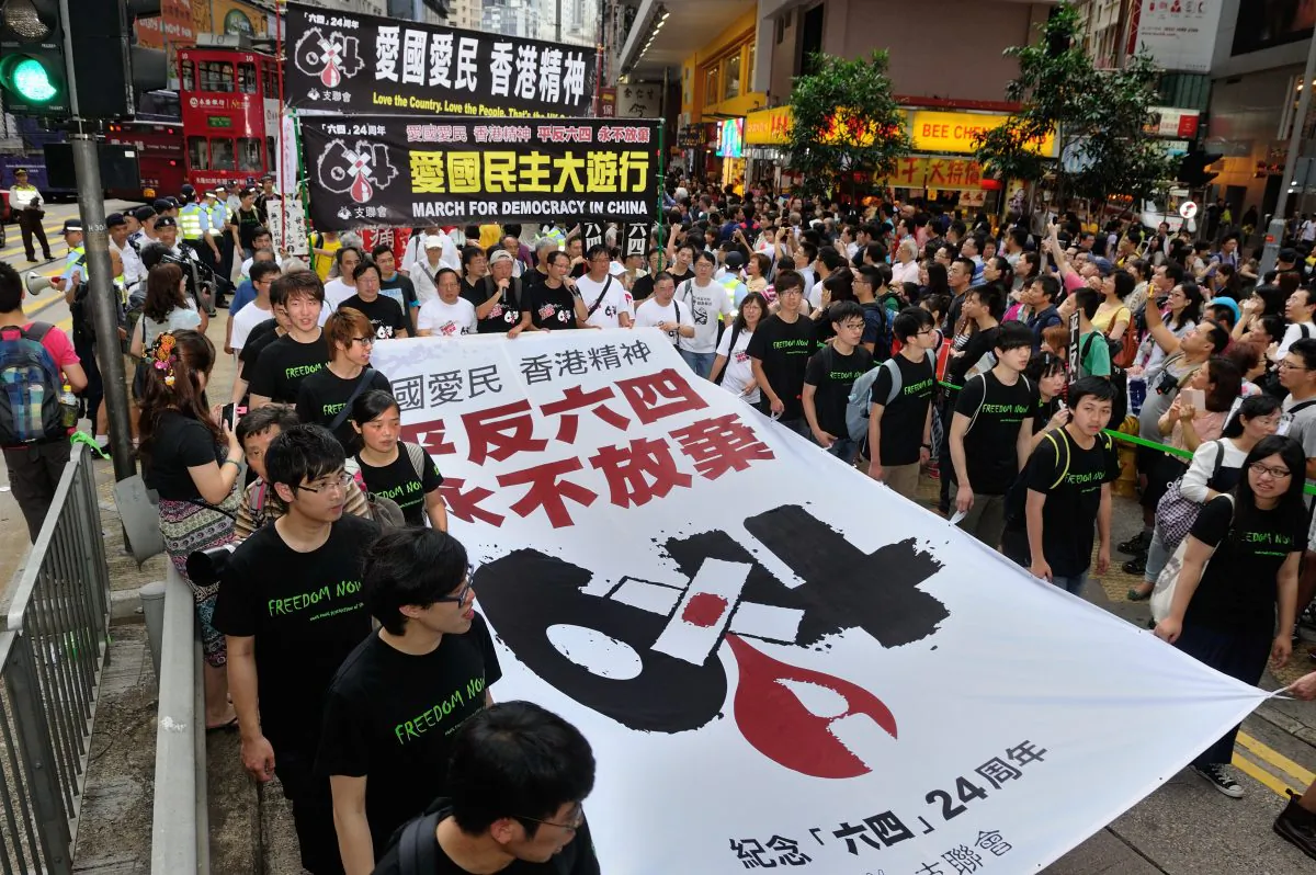 Banner saying "Rehabilitate June 4 incident, never give up". (Song Xianglong/The Epoch Times)