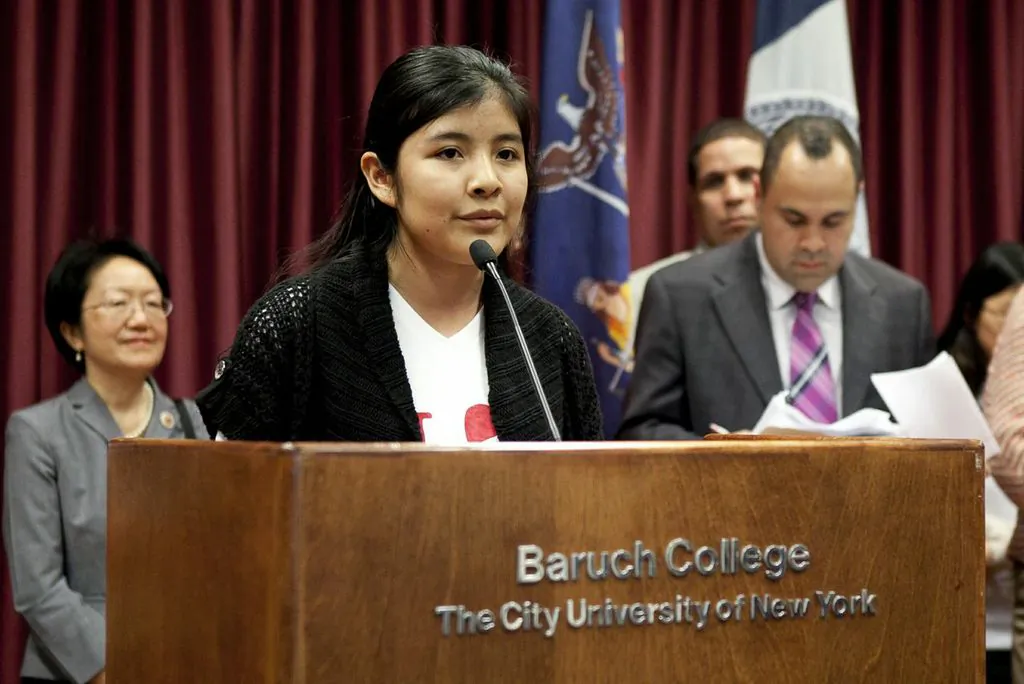 Kassandra Guzman, a Flushing High School senior, speaks in support of the NYS DREAM Act at a New York State DREAM Coalition rally at Baruch College on May 28. (Samira Bouaou/The Epoch Times)