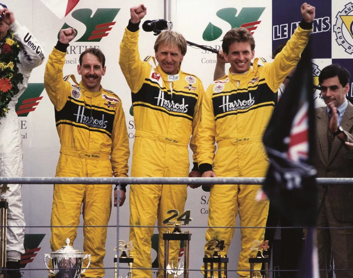 From left to right Andy Wallace, Derek Bell, and Justin Bell in 1995 at the Le Mans Podium. (The Derek Bell Collection)