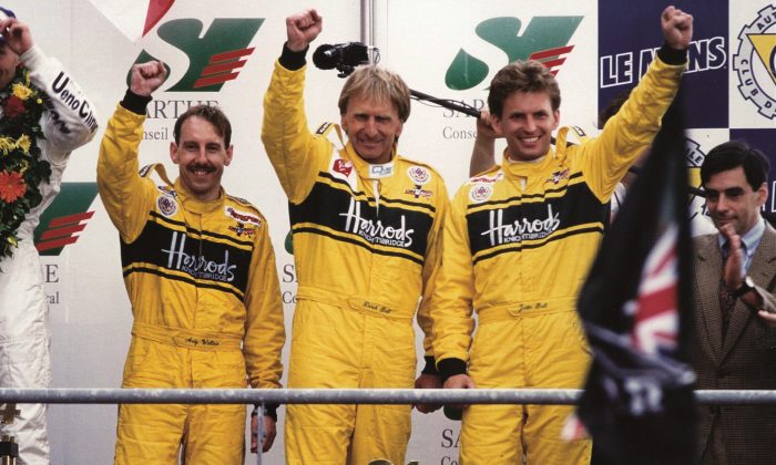 From left to right Andy Wallace, Derek Bell, and Justin Bell in 1995 at the Le Mans Podium. (The Derek Bell Collection)