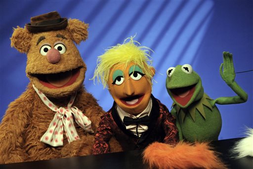 In this Nov. 24, 2008 file photo, Muppets Fozzie Bear, left, a Whatnot, center, and Kermit the Frog make a television appearance in New York. Kermit, Miss Piggy, Bert and Ernie of "Sesame Street" fame, the stars of "Fraggle Rock" and other puppets, costumes and items from throughout Muppets creator Jim Henson's career have been donated to the Museum of the Moving Image, which is building a new gallery to house them, the institution announced Tuesday, May 21, 2013.(AP Photo/Richard Drew