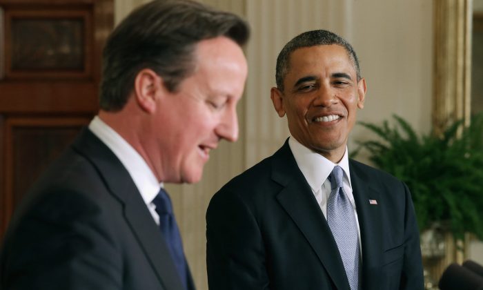 U.S. President Barack Obama and British Prime Minister David Cameron hold a joint news conference in the East Room at the White House in Washington, D.C., on May 13, 2013. (Chip Somodevilla/Getty Images)