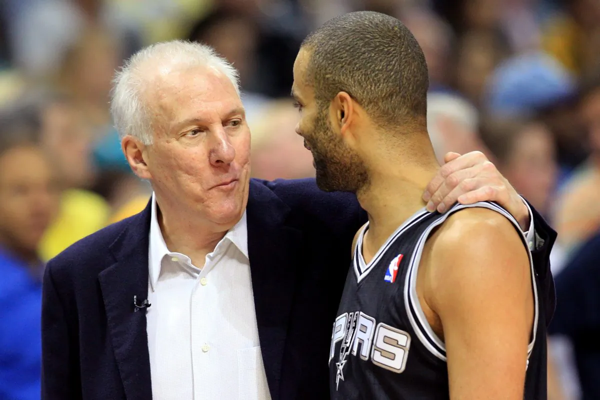  Head coach Gregg Popovich of the San Antonio Spurs talks wtih Tony Parker 9 in the first quarter while taking on the Memphis Grizzlies during Game Four of the Western Conference Finals of the 2013 NBA Playoffs. (Ronald Martinez/Getty Images) 