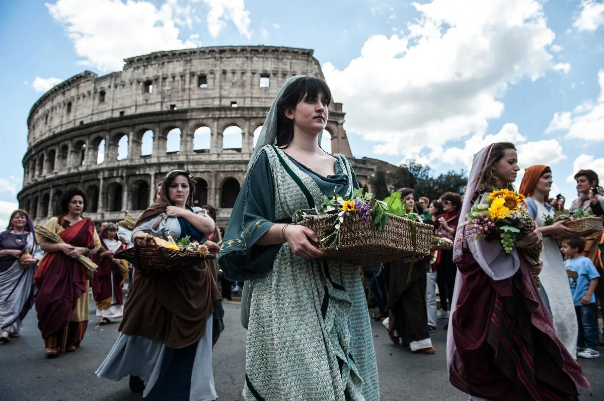Actors dressed as ancient Roman maids march in front of the Coliseum in a commemorative parade during festivities marking the 2,766th anniversary of the founding of Rome on April 21, 2013 in Rome, Italy. The capital celebrates its founding annually based on the legendary foundation of the birth of Rome. Actors dressed as the denizens of ancient Rome participate in parades and re-enactments of the ancient Roman Empire. According to legend, Rome had been founded by Romulus in 753 B.C. in an area surrounded by seven hills. (Giorgio Cosulich/Getty Images)