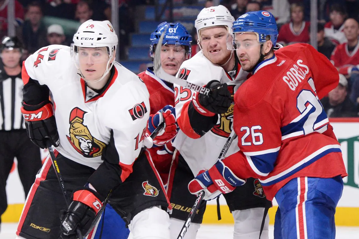 Montreal’s Josh Gorges (far right) and Raphael Diaz (No. 61) battle against Ottawa’s Colin Greening (far left) and Chris Neil (No. 25) at the Bell Centre in Montreal on Feb. 3. (Richard Wolowicz/Getty Images) 