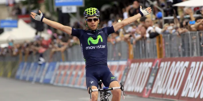Movistar rider Giovanni Visconti celebrates winning his second 2103 Giro d’Italia stage. The Italian rider’s 20-km solo attack got him to the finish line of Stage 17 19 seconds ahead of the peloton. (movistarteam.com)